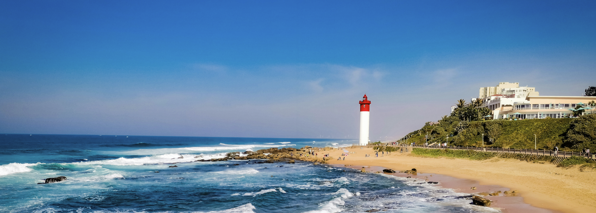 Image of Bronze Beaches and Seaside Scenes: Walking the Umhlanga Rocks Promenade