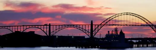 Newport Bayfront Walk: Murals, Crab Boats, and the Historic Bridge